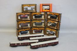 TEN BOXED MAINLINE ROLLING STOCK, also including one Hornby boxed rolling stock plus four TTR