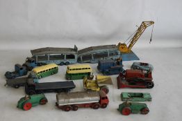 FIFTEEN UNBOXED PLAYWORN DINKY TOYS, to include car transporter, steam roller, Foden tanker,