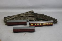 A BOX OF THREE RAIL TRACK AND THREE TRIANG CARRIAGES, together with two Gem authentic model kits,