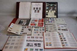 A COLLECTION OF BRITISH & WORLD STAMPS MOSTLY TO ALBUMS, to include a selection of FDCs presentation