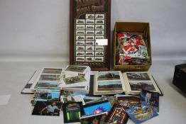 TWO ALBUMS OF POSTCARDS AND PHOTOGRAPHS OF MAINLY TRAINS, plus a quantity of loose postcards and a
