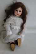 A JUMEAU BISQUE HEADED DOLL, MARKED 