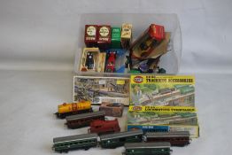 TWELVE BOXED OR CARDED DIECAST VEHICLES BY LLEDO, MATCHBOX ETC., plus a quantity of unboxed