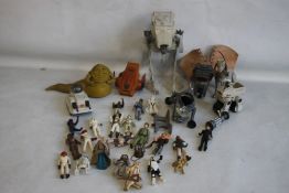 AN UNBOXED STAR WARS SCOUT WALKER, together with a Jabba The Hut and other Star Wars figures
