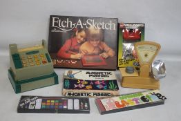 A BOXED VINTAGE ETCH A SKETCH DRAWING TOY, GAF VIEW MASTER AND SLIDES, INGHAM DAY MAGNETIC FISHING