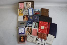 A COLLECTION OF VINTAGE PLAYING CARDS, to include advertising packs for Cosmos Lamps, Davidson and