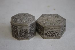 Two CHINESE EXPORT WARE WHITE METAL SNUFF/TRINKET BOXES, all with typical embossed decoration the