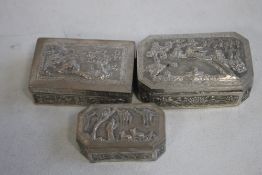 THREE CHINESE EXPORT WARE WHITE METAL SNUFF/TRINKET BOXES, all with typical embossed decoration