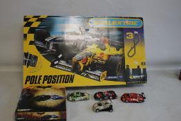 A BOXED SCALEXTRIC POLE POSITION SET to include Williams BMC No. 10 and Jordan Honda No. 9 cars