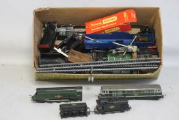 A BOX OFF 00 GAUGE TRAIN PARTS FOR REPAIRS, together with three TT gauge locomotives