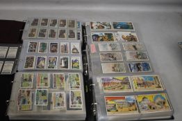 SIX FOLDERS CONTAINING SETS OF COLLECTORS CARDS BY STOLLWERK, LIEBIG, SUGAR PUFFS, WILLS, BADSHAH