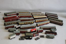 A BOX CONTAINING 22 DUBLO RAILWAY CARRIAGES 'OO GAUGE', and twenty pieces of Hornby Rolling Stock.