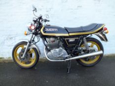 A 1982 DUCATI 350 GTV MOTORCYCLE 'JKK 901Y', having black coachwork, gold painted wheels and