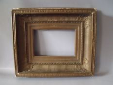 A 19TH CENTURY GOLD FRAME WITH INTEGRAL SLIP, frame W 12 cm, frame rebate 17 x 24 cm