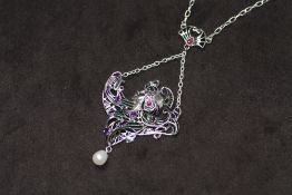 A SILVER PLIQUE A JOUR GYPSY / EXOTIC DANCER NECKLACE, set with a suspended pearl, rubies, amethysts