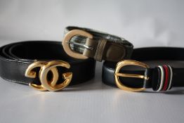 A VINTAGE BLACK LEATHER GUCCI D BELT WITH GOLDTONE DOUBLE G BUCKLE, L 93 cm, together with a navy
