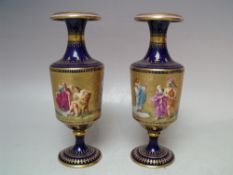 A PAIR OF ROYAL VIENNA GILDED PORCELAIN VASES, signature to bottom edge of figural central band,