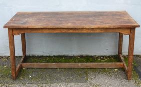 AN EARLY 20TH CENTURY ARTS AND CRAFTS STYLE REFECTORY TABLE, the twin plank top above shaped squared