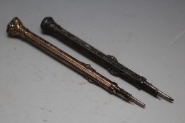 A GILT PROPELLING COMBINATION PEN AND PENCIL, with bloodstone type set finial, together with a