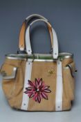 A COACH LINEN HANDBAG, open topped with flat leather handles, stitched floral detailing, two