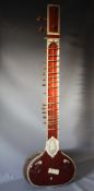 A 20TH CENTURY INDIAN SITAR WITH ENGRAVED IVORY PANELS, H 128 cm, S/DCondition Report:Damage /