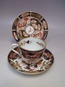 A ROYAL CROWN DERBY COFFEE CAN AND SAUCER, pattern no. 2451, together with a shaped dish (3)