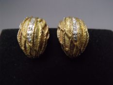 A PAIR OF 18CT GOLD AND DIAMOND SET CLIP ON EARRINGS, approx 11g