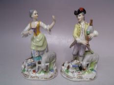 A PAIR OF CONTINENTAL CERAMIC FIGURES, with crossed sword backstamps, tallest H 16 cm