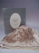 A VINTAGE CHRISTIAN DIOR SILK SCARF, neutral tones with palm tree style pattern, approximately 68