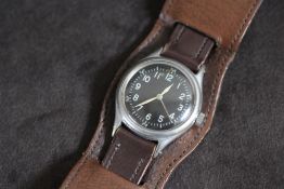 A BULOVA MILITARY A-11 TYPE WRIST WATCH, stamped spec no94-27834 serial NO AF 54714 PART NO 10 AKCSH