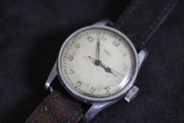 AN EBEL MILITARY TYPE WRIST WATCH, stamped to reverse A.M, 6B/159 8749/42, Dia 3.75 cm
