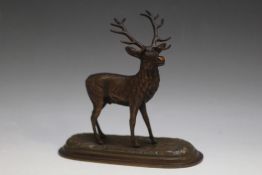 A BRONZE OF A DEER, signed A Leonard, W 17.5 cm