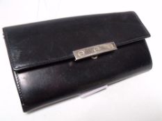 A CARTIER OF PARIS BLACK LEATHER LADIES WALLET, subtle textured effect finish, note compartment, zip