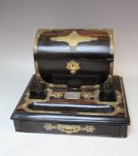 A 19TH CENTURY COROMANDEL STATIONARY DESK STAND WITH BRASS MOUNTS, the hinged lid compartment
