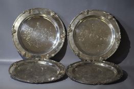 FOUR VINTAGE SILVER PLATED CIRCULAR CEREMONIAL PLATES, having the Marquis of Londonderry crest, Dia.