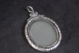A FRENCH TYPE SILVER MINIATURE PICTURE FRAME, H 8 cm