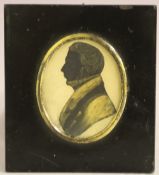 (XIX). Oval portrait miniature of a gentleman in black jacket and white stock, silhouette verso,
