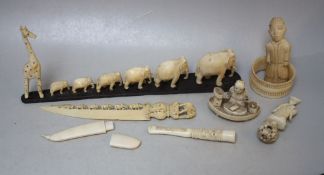 A COLLECTION OF ASSORTED LATE 19TH / EARLY 20TH CENTURY IVORY PIECES, to include an elephant