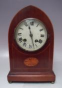 A VICTORIAN MAHOGANY ARCHED MANTLE CLOCK, having inlaid satinwood detail to the case, H 28.5 cm