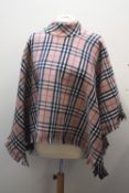 A VINTAGE BURBERRY CAPE / PONCHO, with fringe detailing to bottom edge, one size
