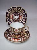 A ROYAL CROWN DERBY TEA CUP AND SAUCER, together with a shallow bowl / dish (3)
