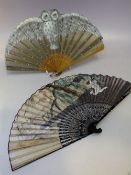 A VINTAGE EBONISED FOLDING FAN WITH HAND PAINTED EMBELLISHMENT, L 20.5 cm, together with a smaller