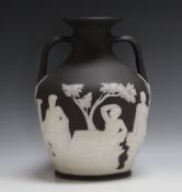 A WEDGWOOD BLACK JASPERWARE PORTLAND VASE, A/f H 25.5 cmCondition Report:some relief missing, see