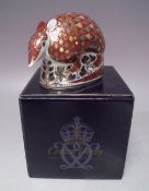 A ROYAL CROWN DERBY 'ARMADILLO' PAPERWEIGHT, gold stopper, boxed