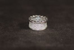 A BVLGARI 18 CARAT WHITE GOLD DIAMOND PAVE SET RING, set with an estimated 2.3 carats of brilliant