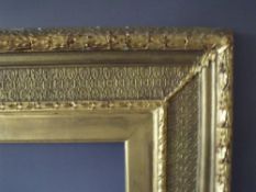 A 19TH CENTURY DECORATIVE GOLD FRAME WITH GOLD SLIP, frame W 12 cm, frame rebate 69 x 59 cm, slip