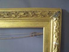 A 19TH CENTURY GILT FRAME WITH ACANTHUS LEAF DESIGN TO EDGE AND GOLD SLIP, frame W 7 cm, frame