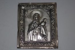 A WHITE METAL ORTHODOX ICON, W 11.5 cm