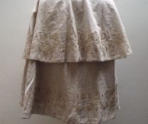 AN EARLY 20TH CENTURY LADIES DOUBLE CAPE WITH EMBROIDERED EMBELLISHMENT, with faults