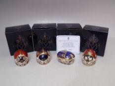 A ROYAL CROWN DERBY 'MILLENNIUM BUG' PAPERWEIGHT, gold stopper, boxed, with certificate,. together